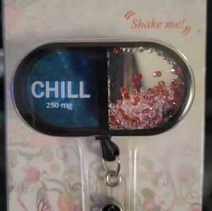 Koi Nurse badge reel shaker cute chill pill